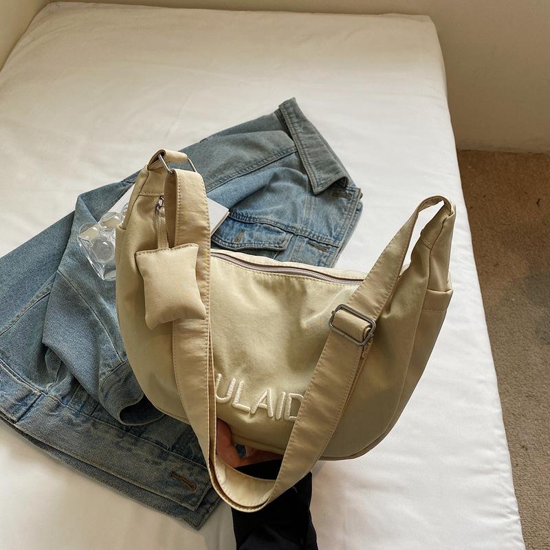 

Autumn new trend fashion dumpling bag women s simple casual light shoulder bag niche design student messenger bag хакі
