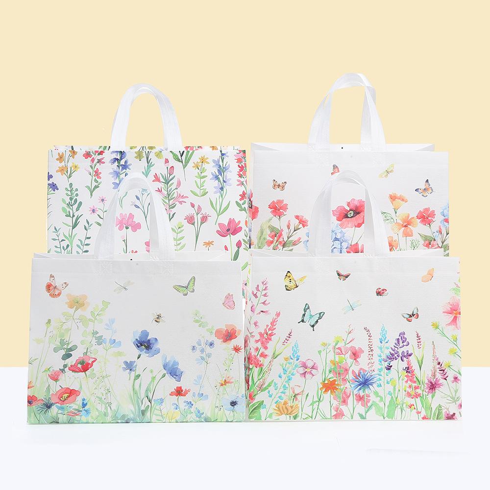 

12pcs Floral Print Gift Bags Non-Woven Fabric Tote Bags for Birthday Parties Events and Special Occasions Candy Gift Packaging 12pcs&33x25x17cm