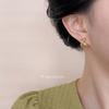 Fashion texture sense European and American style cross earrings design sense personality versatile curved fishtail high sense earrings
