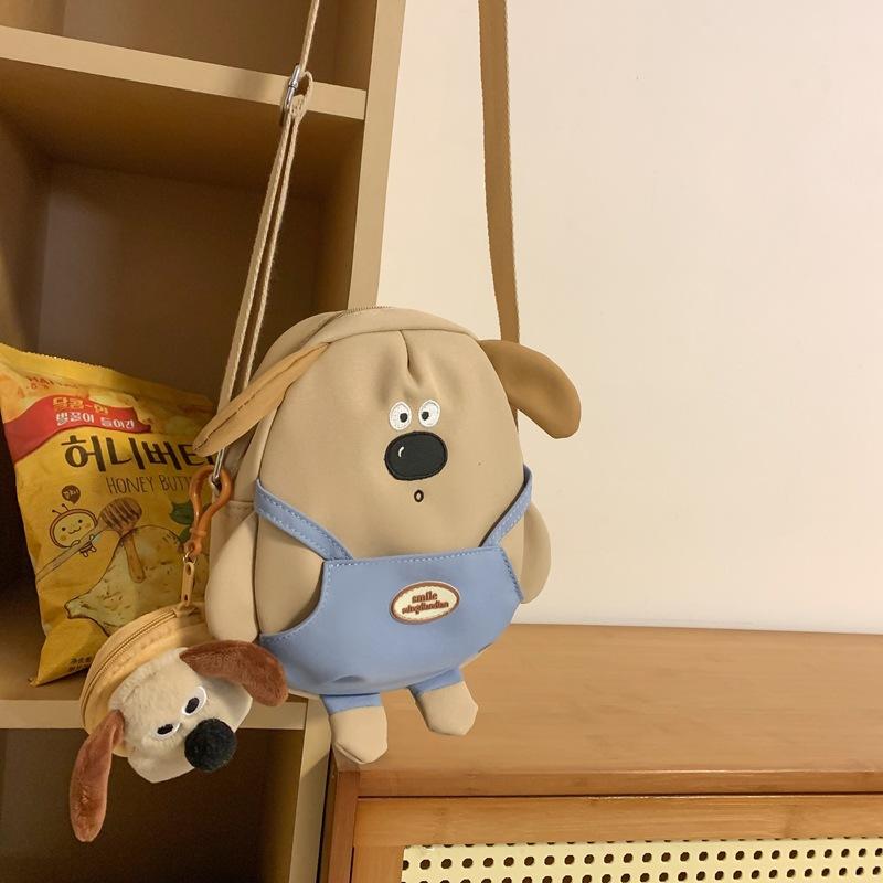 Small backpack female ins new cute cute cute big nose puppy cartoon bag girl soft heart oblique span bag