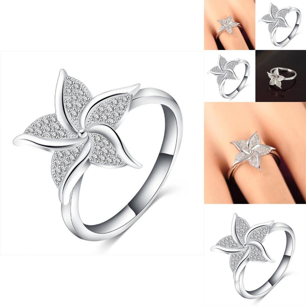 Stunning Fashion Windmill Shape Ring With Silver Plated Flower Design For Women