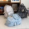 Star schoolbag ins niche high value junior high school students large capacity 2025 new student pain bag backpack women