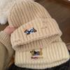 Korean version of cartoon puppy embroidery knitted hat female warm sweet cute versatile face small pullover hat tide