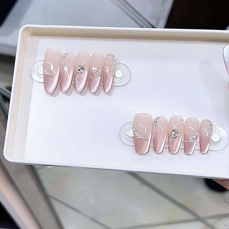 Handgewebte Rüstung Neue Rosa Hühnerohren im Frühling und Sommer Kühl und Sommer Eis-Transparentes Katzenaugen-Nageldesign