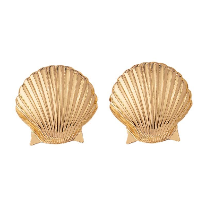 Modne kolczyki z elementami muszli: Metalowe ćwieki inspirowane stylem europejskim i amerykańskim