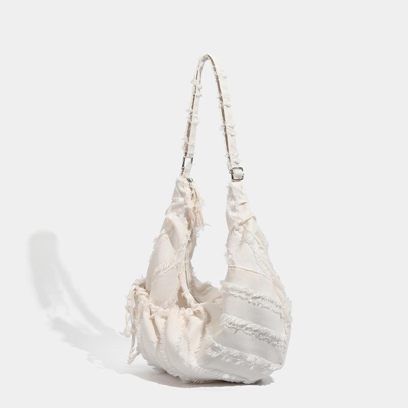 2025 Korean ins Lazy Wind Folded Drawstring Canvas Bag Versatile Commuter Large Capacity One Shoulder Oblique Span Dumpling Bag