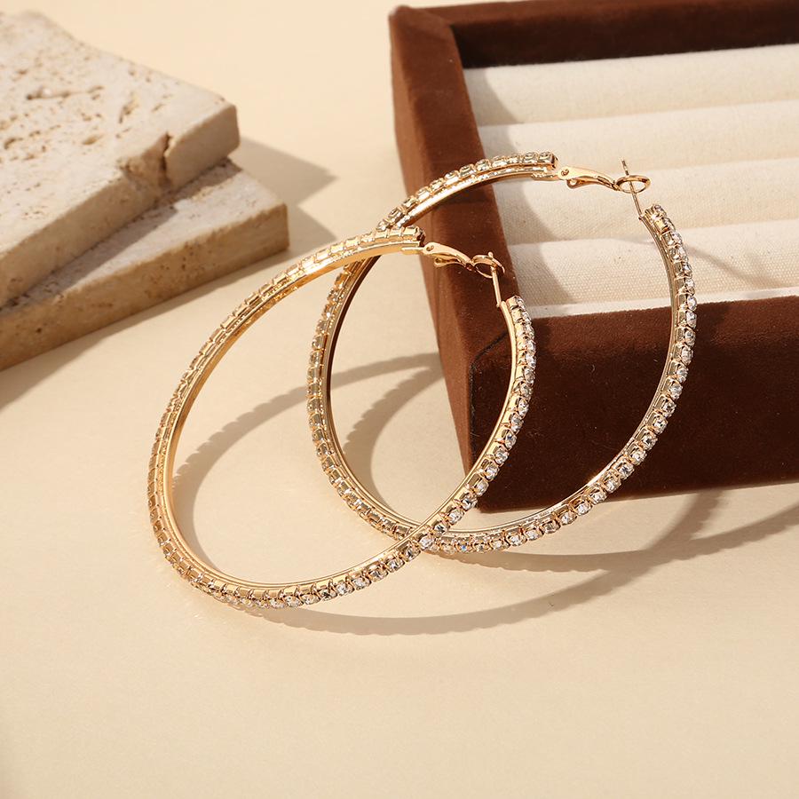 Korean Cold Style Luxury Diamond C-Shaped Earrings – Trendy and Elegant Design