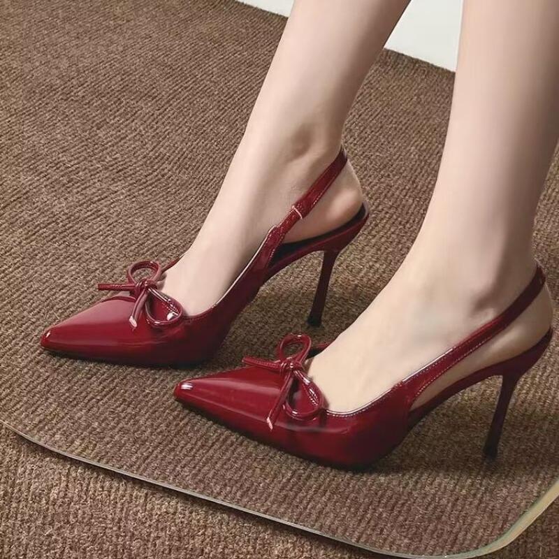 Evening breeze beautiful bow high heels women's summer new pointed thin heel light mouth fairy wind bag head sandals
