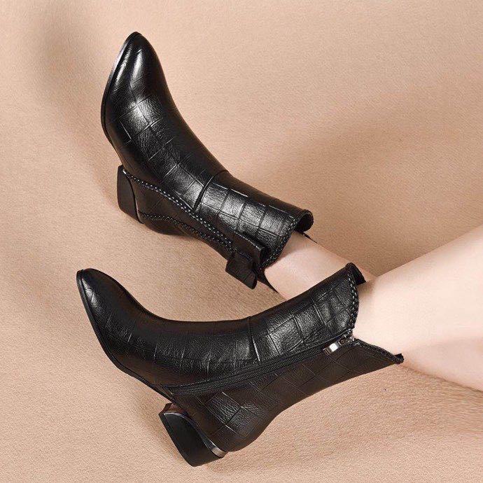 Pointed fashion short boots women's autumn and winter new black bow embossed cowhide side zipper medium boots