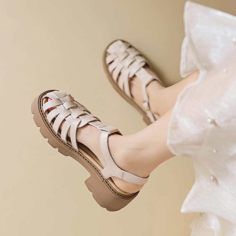 Augustine Roman sandals women's 2025 new summer white baotou pig cage shoes retro woven hollow sandals