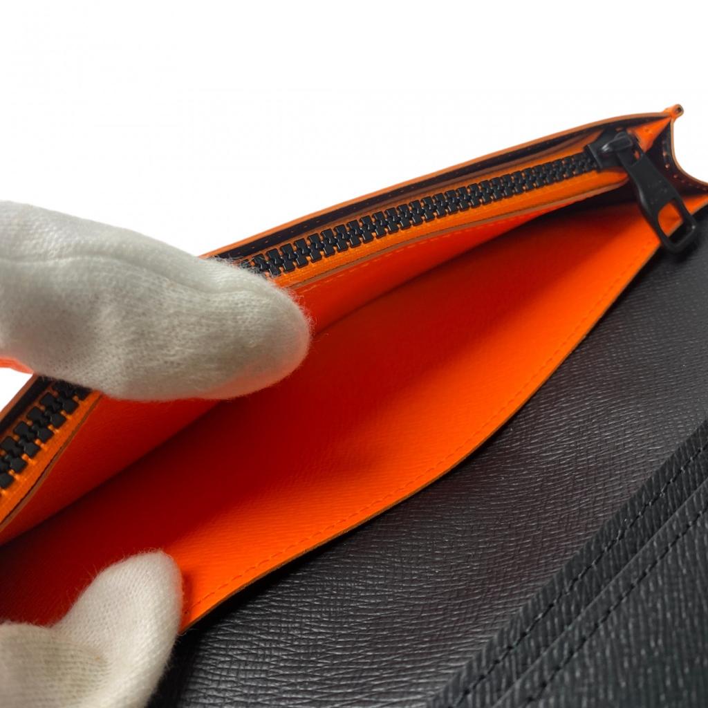 Używany portfel LOUIS VUITTON Seria Brązowo/Pomarańczowa PVC męski