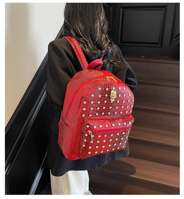 Schoolbag1011 new Korean version fashion rivet soft pu texture solid color backpack casual women's backpack trendy bag