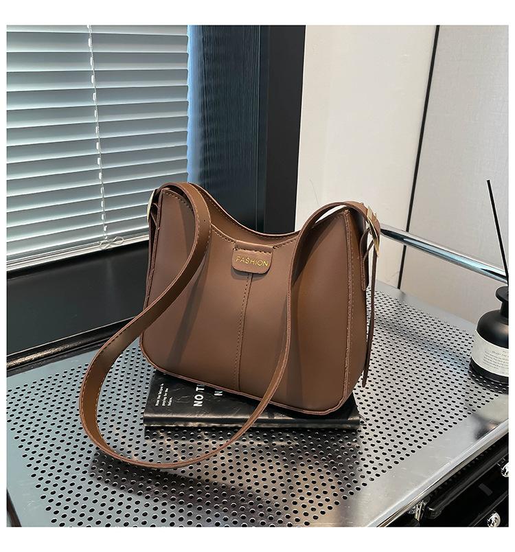 

Повседневная большая вместимость 225 весна новый тренд мода однотонная простая сумка-кроссбоди на плечо в виде ведра темно-коричневого