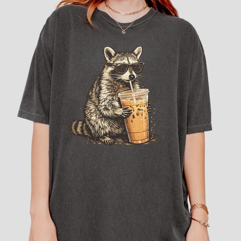 Raccoon Drinking Iced Coffee Shirt Funny Animal Meme Tee Coffee Lover Shirt Unisex T-Shirt XL