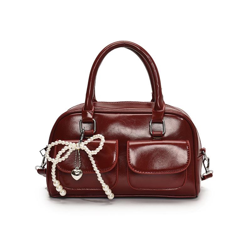 

Fashion niche bowling bag handbag women s 2025 new trend Boston bag shoulder messenger bag no pendant червоний