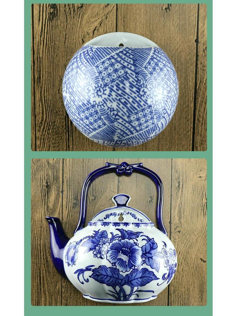 Hand-Painted Blue and White Ceramic Wall Vase with Floral and Bird Design