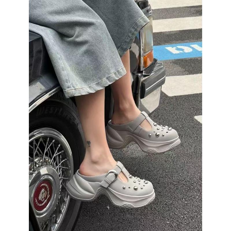 Fashion leather outer wear round head hole shoes women's new thick sole height increase small rivet hollow bag head drag