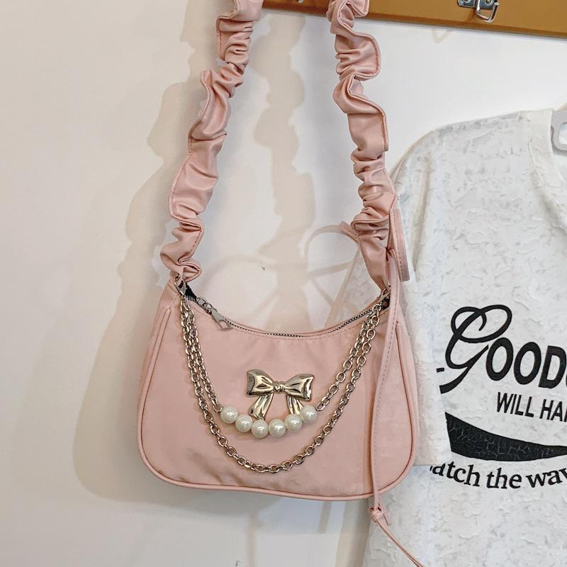 

Niche design single shoulder armpit bag women are popular this year 2025 new foreign style bow beautiful personalized crescent bag розовый