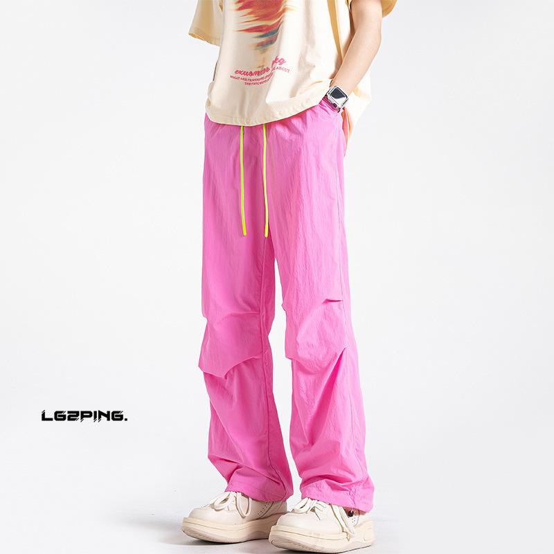 

Літні тонкі штани з парашутом. Чоловічі модні брендові американські робочі штани. Прямі штани. Швидко висихаючі спортивні повсякденні штани. 5XL рожевий