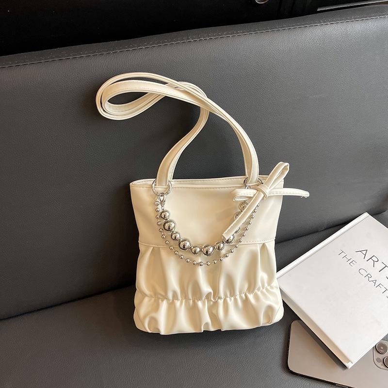 

Солодка леді бант маленька сумка 2024 літня мода бісерна сумка через плече нішевий дизайн жіноча сумка