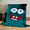 Bright cartoon face with large blue eyes, wide smile, and prominent teeth. for all seasons blanket lunch break throw gift