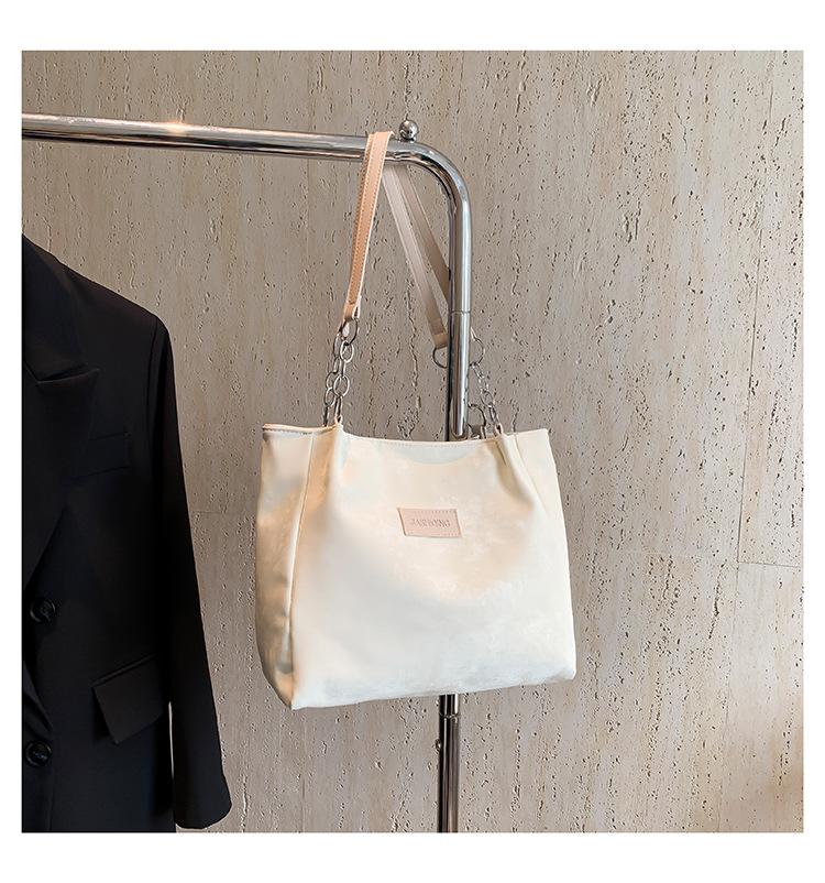 

Літня повсякденна сумка великої місткості жіноча 2024 нова модна та свіжа сумка через плече текстурована дорожня сумка через плече білий