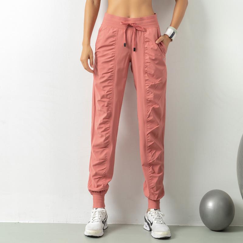Women's Quick-Dry Yoga Fitness Nine-Point Cuffed Pants with Pockets