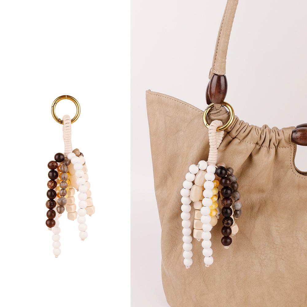 Исполняющий желания брелок-амулет из нити семян Бодхи - Плетёный вручную натуральный брелок-подвеска с бирюзой.