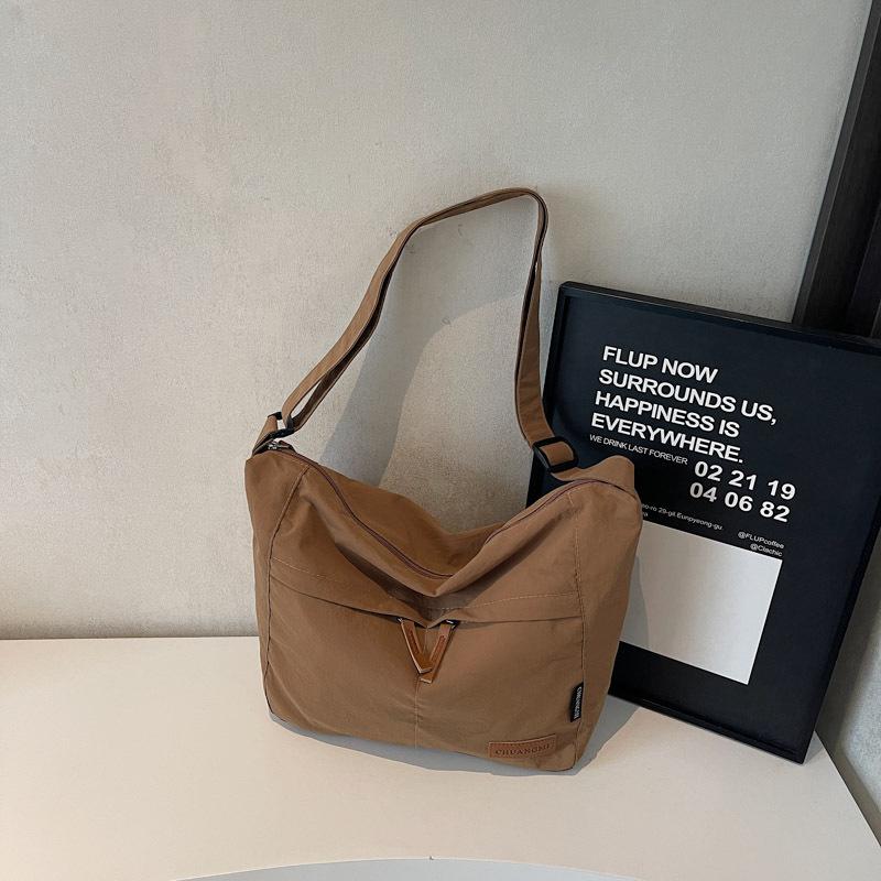 Canvas bag women's large-capacity new versatile shoulder messenger bag cloth bag class commuter tote bag