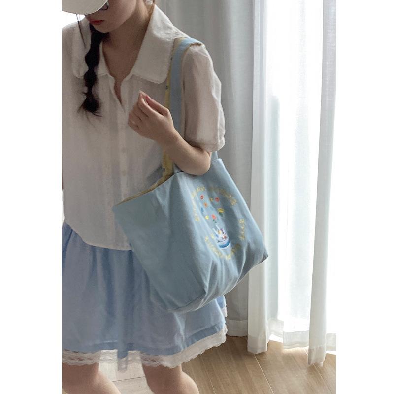 

Korean canvas bag large capacity women s underarm bag 2025 new reversible shoulder bag fashionable casual class bag синій