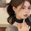 111 silver needles, a two-wearing ball fringed earring, with a sense of design and temperament, light luxury earrings, showing face and thin earrings.