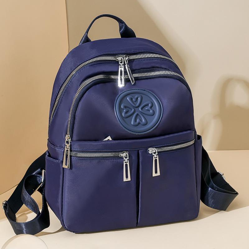 Leichter lässiger Rucksack große Kapazität außen Mehrfachtasche Reiserucksack Nylon einfache College-Tasche