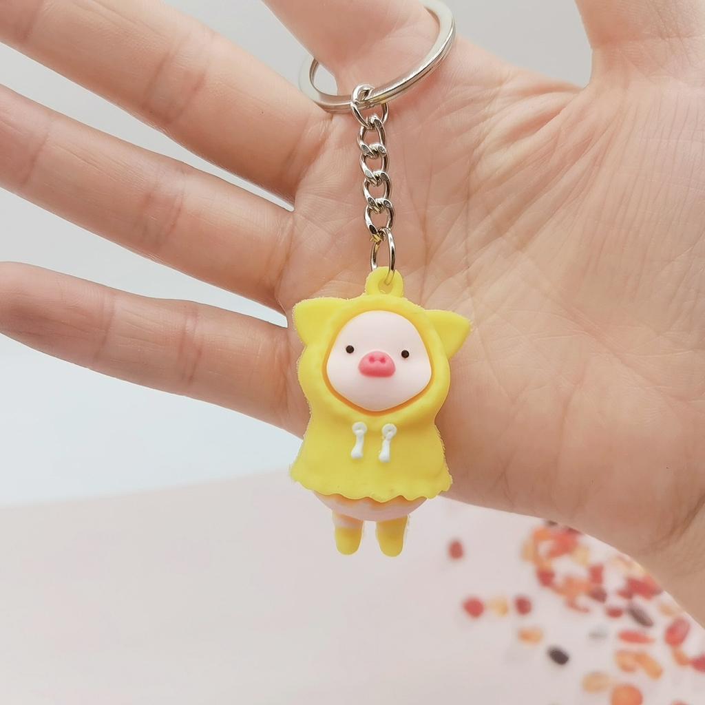 2021 Ny tegneserie regnfrakk Piggy nøkkelring PVC myk nøkkel godteri Fargepose Anheng Personlighet Student Par Gave