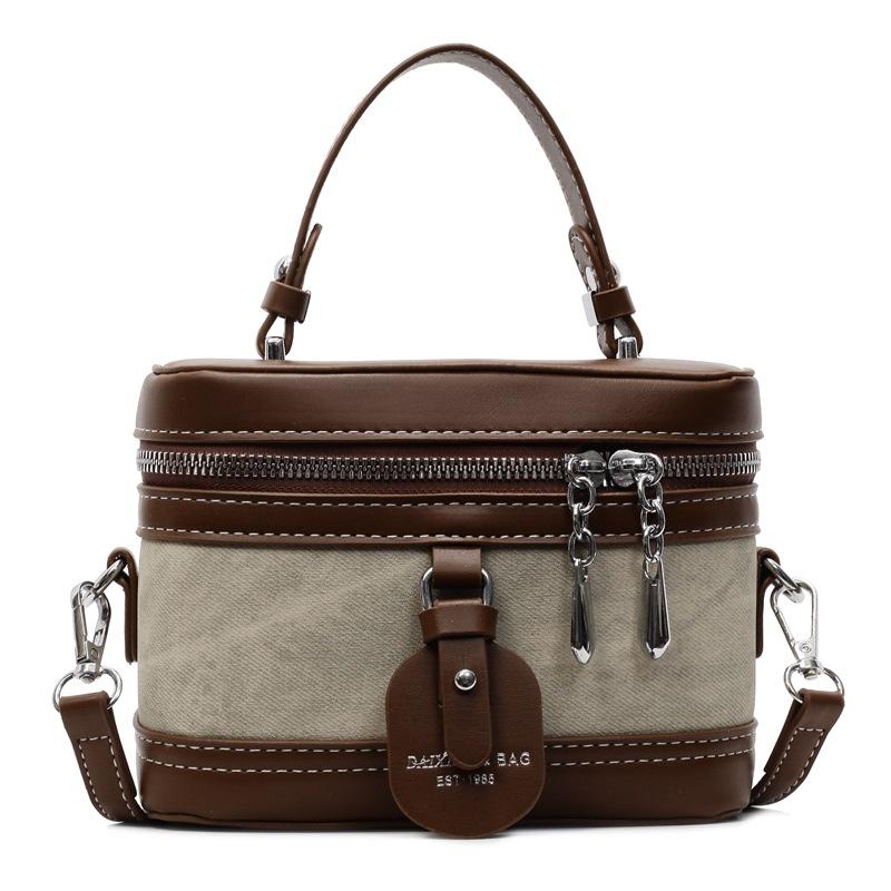 Trend wholesale niche personality contrasting colors fashionable portable box bag Korean version versatile casual commuter wind messenger women's bag