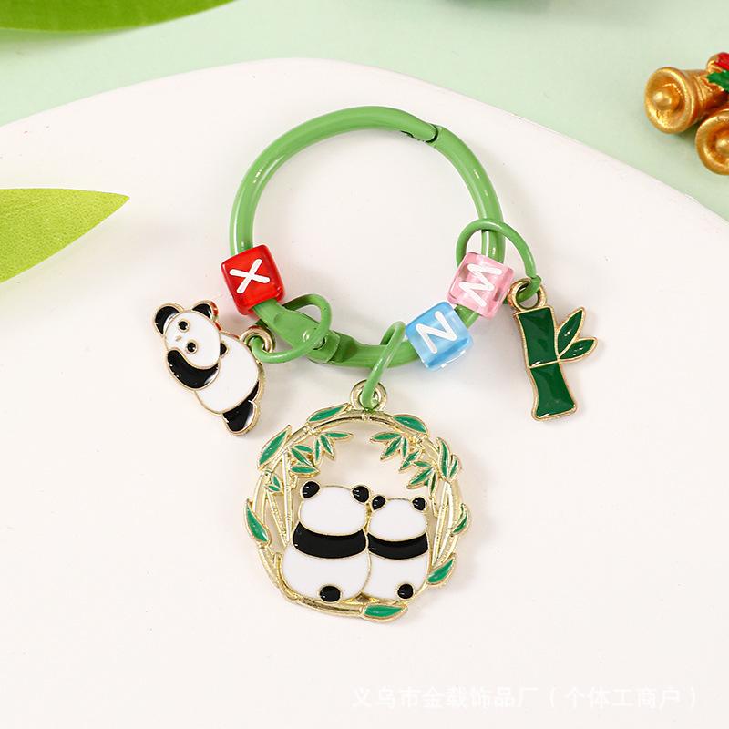 

Creative Panda Metal Keychain with Bamboo Pendant - Cute, Cartoon-Style Accessory for Bags