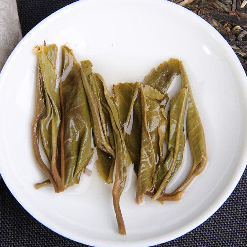 Yunnan Pu'er Tee Liangpin Serie 2017 Haiwan Alter Kamerad Liangyuan Rohkuchen 400g