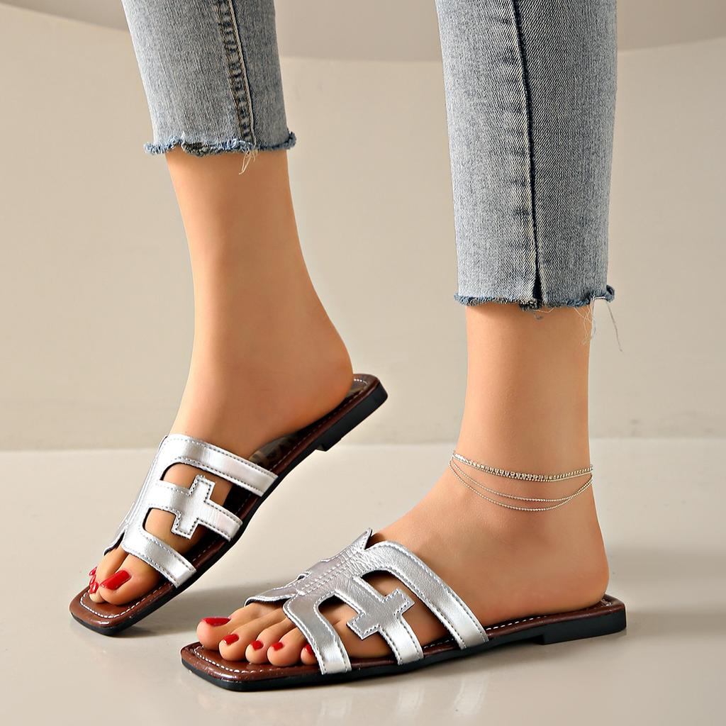 Nowe modne kapcie damskie seksowne sandały na płaskim obcasie Casual Ladies Sand kapcie plażowe eleganckie kapcie z odkrytymi palcami kapcie damskie