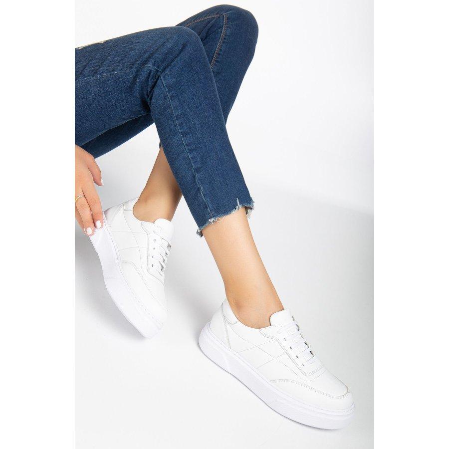 

Женские кроссовки из натуральной кожи 36 белый