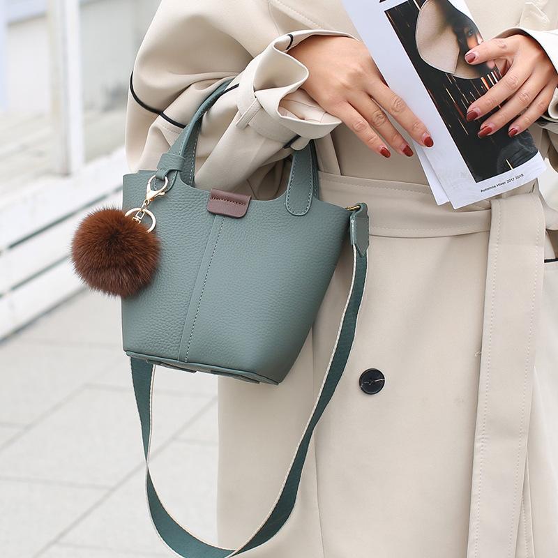 New versatile first-layer cowhide women's handbag light luxury leather large-capacity vegetable basket women's bag storage