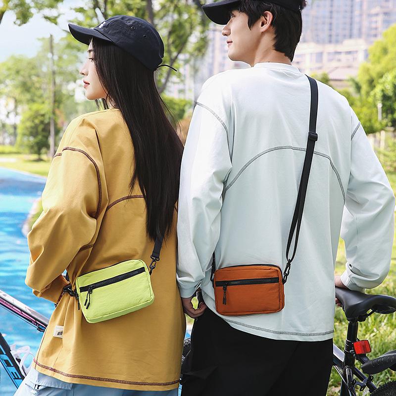 Lightweight solid color messenger bag sports cycling small square bag outdoor commuting shoulder bag daily portable card bag mobile phone bag
