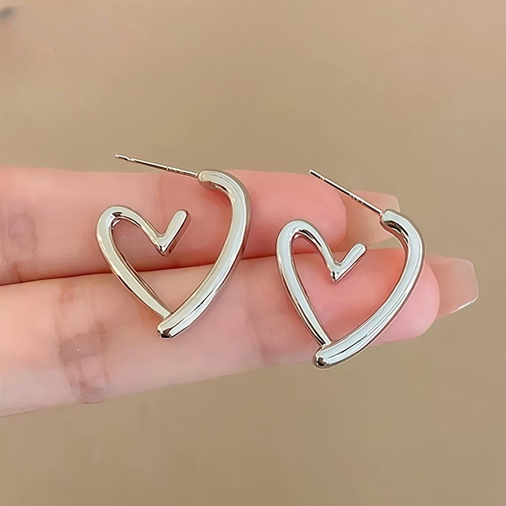Unique Heart-Shaped Hollow Stud Earrings: Fashionable, Versatile, and Exquisite Design for Women