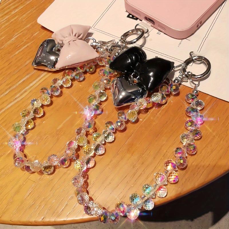 Ins style beaded phone wrist chain, love tie design, universal anti-lost short pendant lanyard for women outdoor shopping travel.