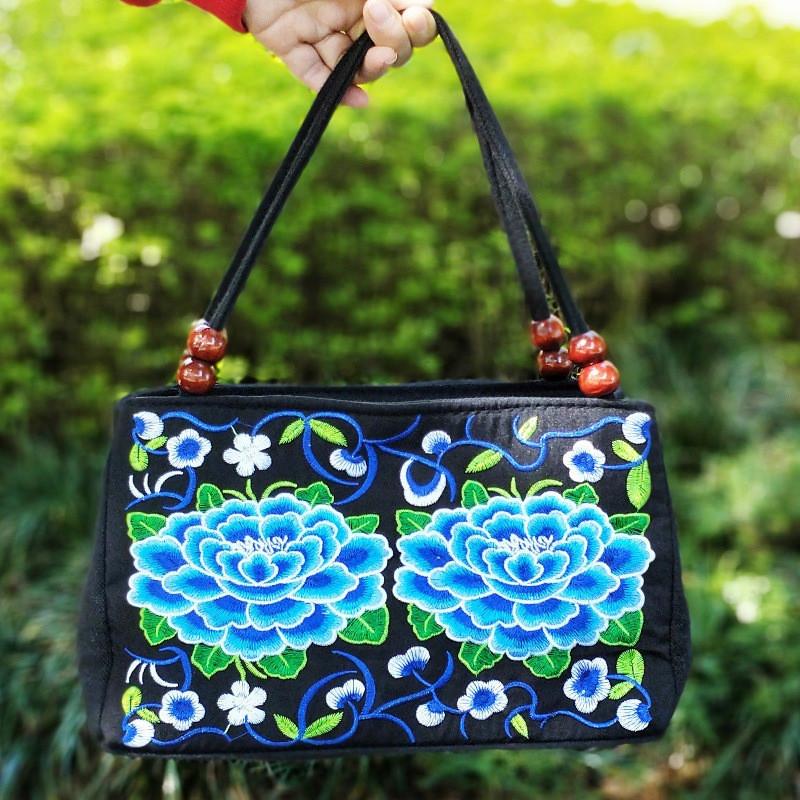 Artful Ethnic Doublesided Embroidered Canvas Handbag With Wooden Bead Accessories For Daily Use