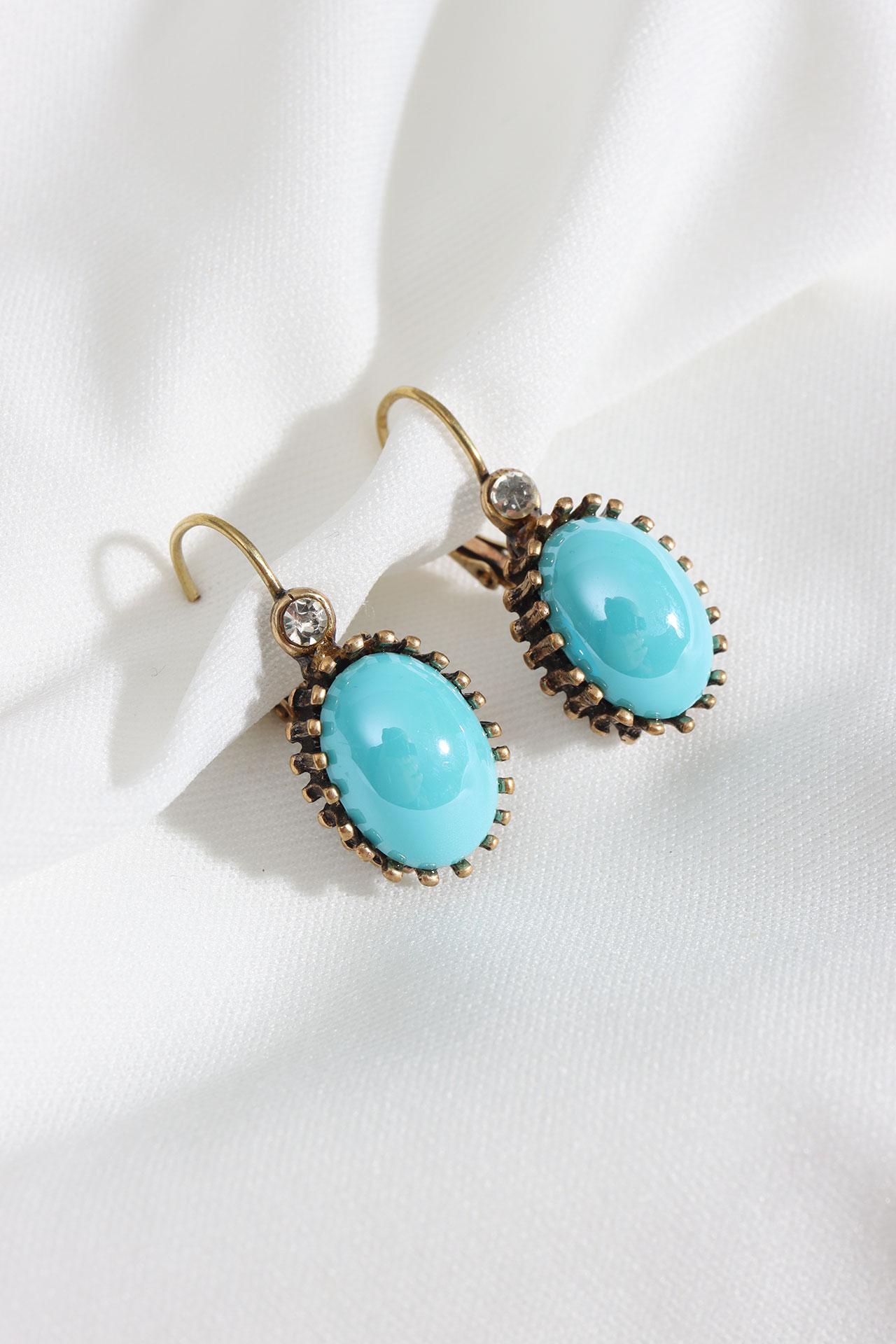 

Оригинальные серьги синей овальной формы