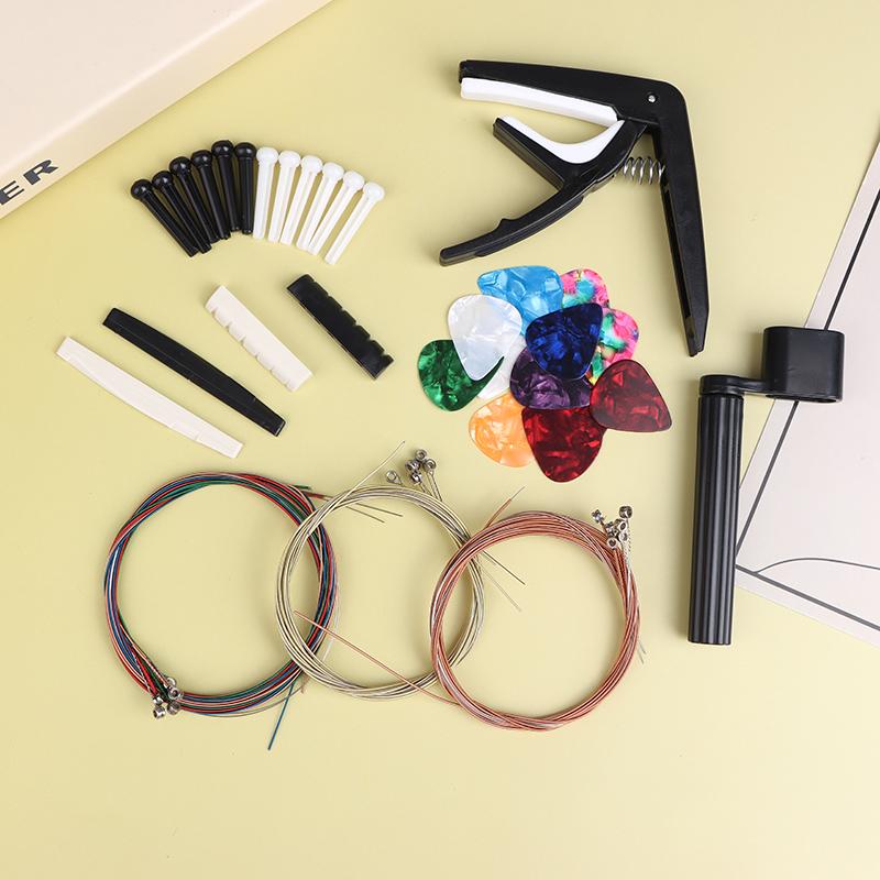 Kit di accessori per chitarra acustica da 48 pezzi/set Capotasto Corde Plettri Avvolgicorde Pin del ponte Sellette Kit di cura per chitarra All-In-One Per Principiante