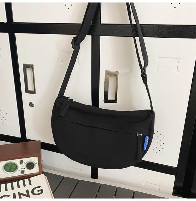 

New women s messenger bag small backpack trendy brand women s bag solid color unisex shoulder bag couple bag чорний