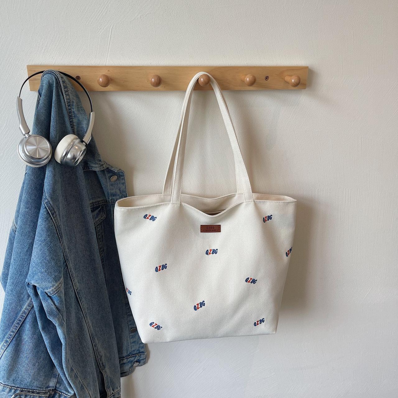 

Трендовая холщовая сумка-тоут с вышивкой 2025 для женщин - Большая вместимость, сумка на одно плечо для студентов 43*14*31 cm грязно-белый