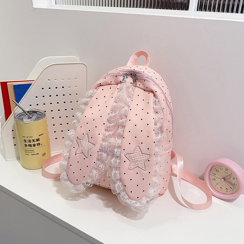 Schoolbag Korean version of sweet girl polka dot lace backpack new lop-eared rabbit trend high value travel foreign style backpack