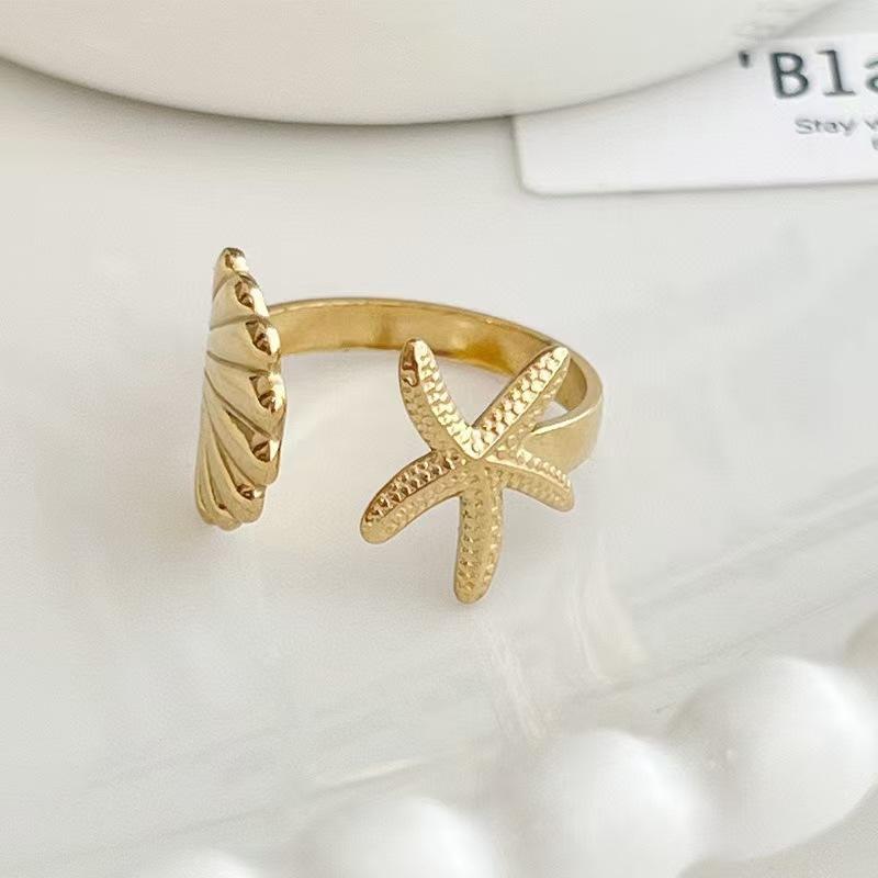 

Европейская и американская мода Популярный дизайн в виде морской звезды и ракушки Открытое кольцо, Женственное ощущение Морская поездка Ношение кольца Оптом золотой