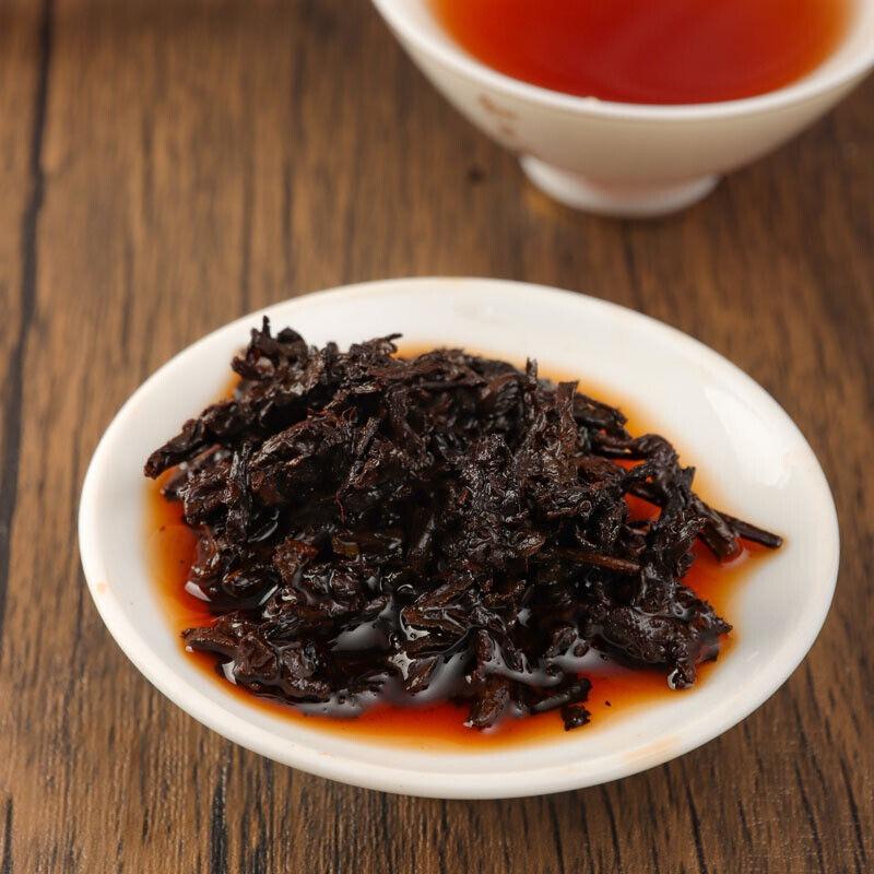 Pu'er Tee Kuchen Charm 357g Pu-er Reifer Tee Menghai Puerh Tee Reifer Tee